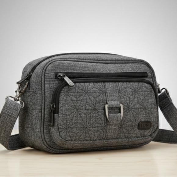 lug Handbags - LUG Carousel Dark Gray Crossbody Bag 9.5" L × 5.5" H × 2" W Multiple pockets